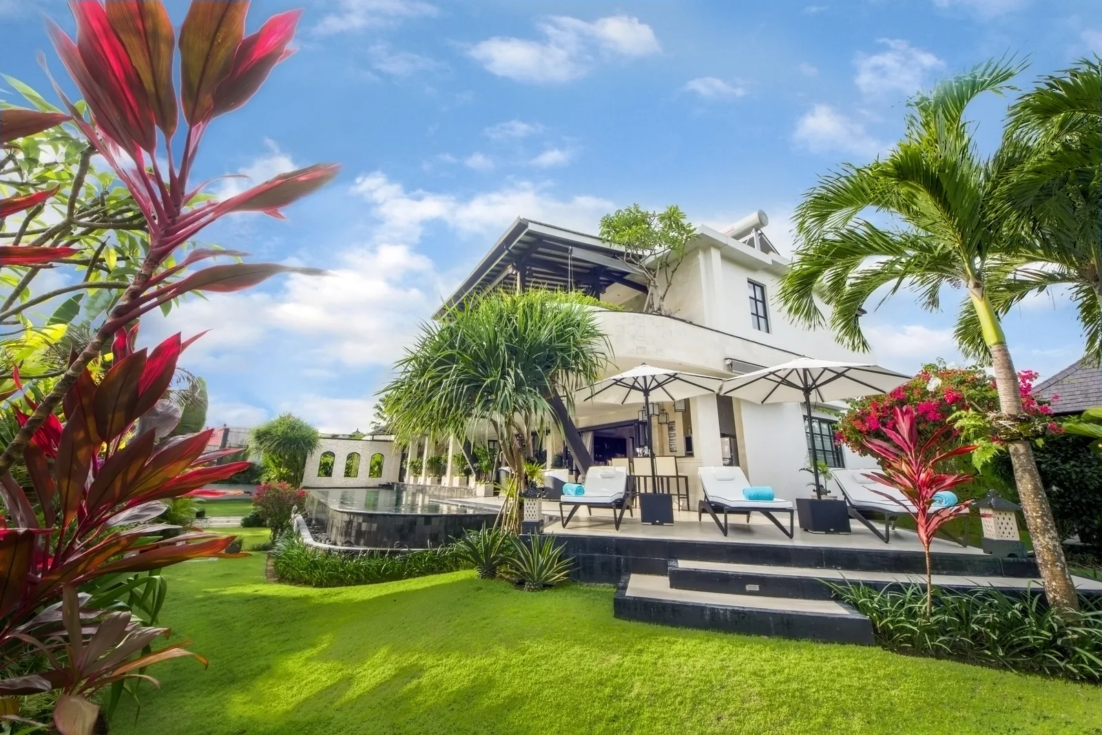 Sunlit Villa Facade & Lawn